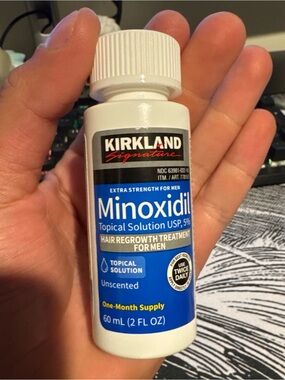 Kirkland Signature Minoxidil Topical Solution - Blue and White Bottle